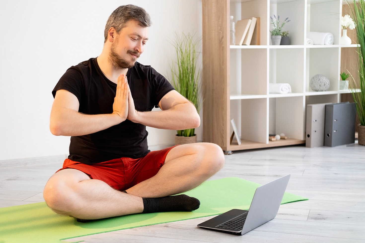 practicing yoga at home